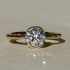 Sophie Hughes Poppy Bezel Solitaire in 18K Yellow Gold featuring a 1.5-ct Round Brilliant diamond