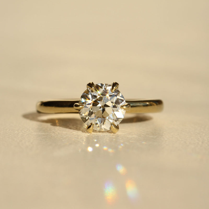 Sophie Hughes Six Prong Solitaire in 18K Yellow Gold featuring a 1.25-ct Antique Old European cut diamond, from the side