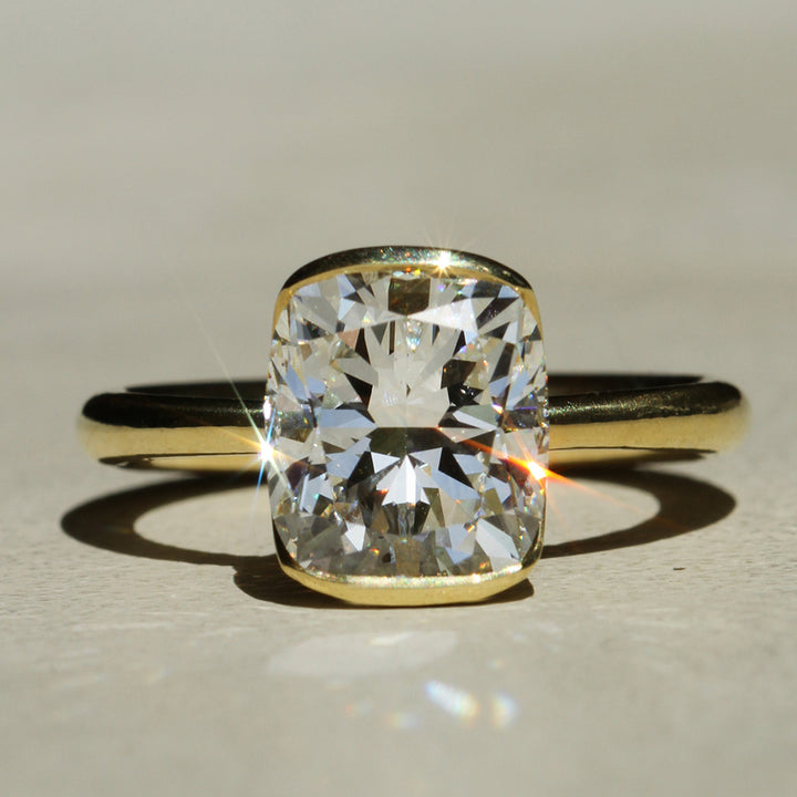 Poppy Bezel - Elongated Cushion Solitaire