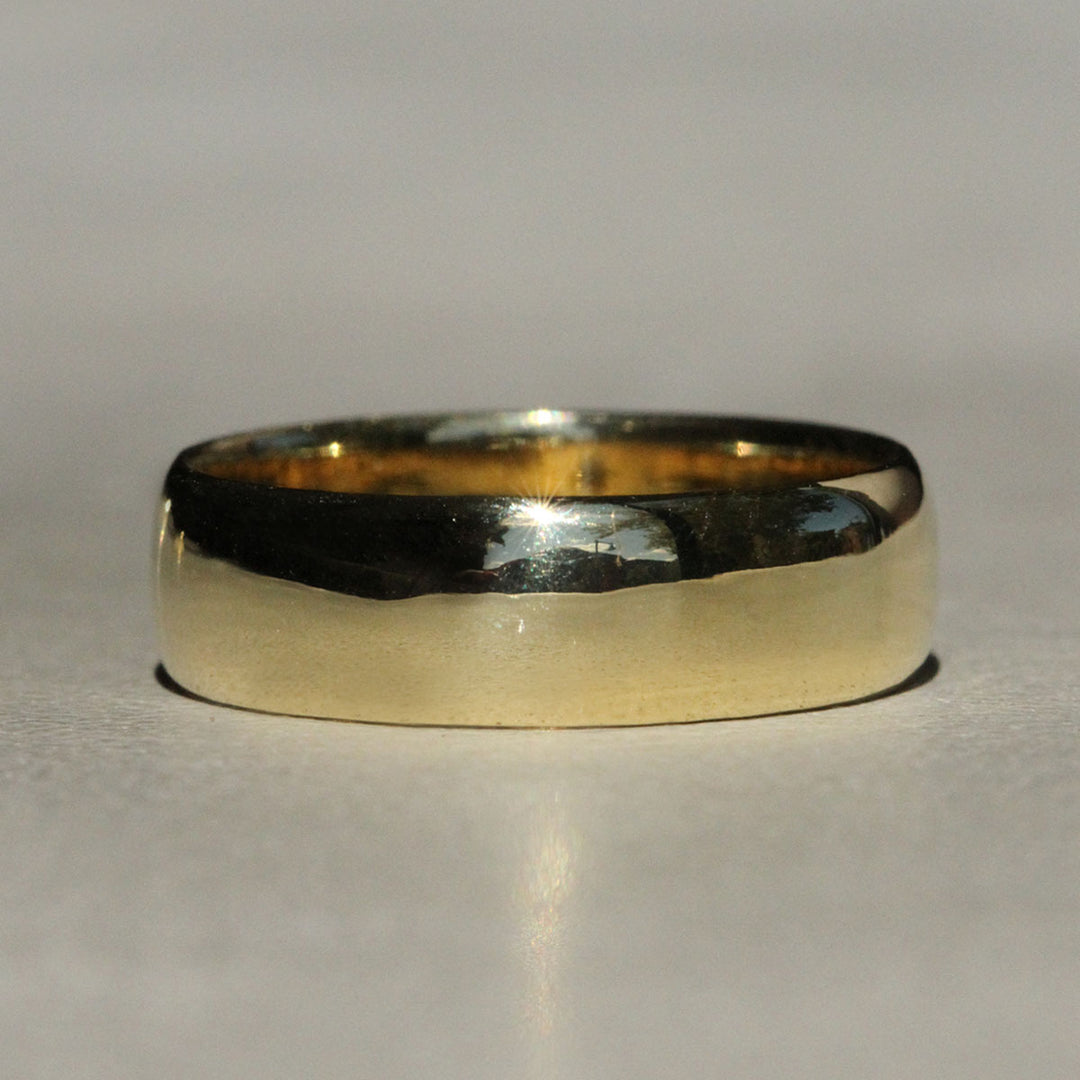 Sophie Hughes Classic Cigar Band in 18K Yellow Gold, featured in the wide 5.5mm width