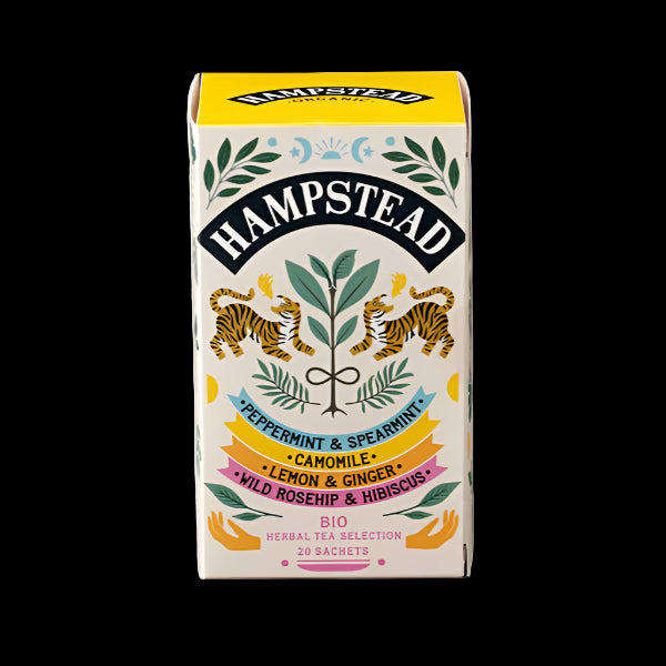 A box of Hampstead Organic Herbal Tea with illustrations of peppermint, spearmint, camomile, lemon, ginger, rosehip, and hibiscus on the packaging.
