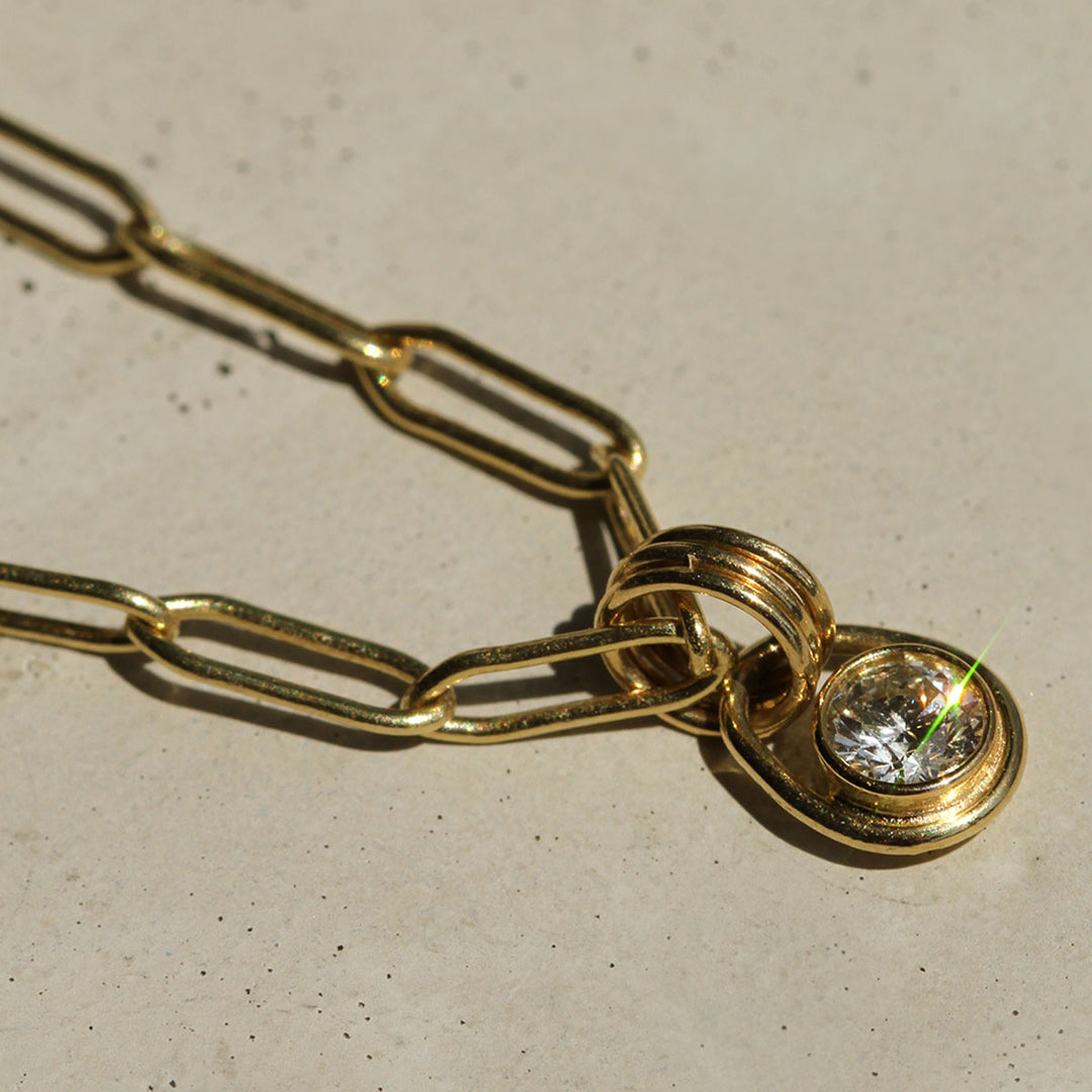 Orbit Diamond Charm