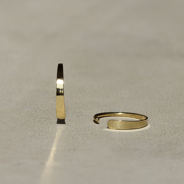 Polished Tiny Flared Hoops