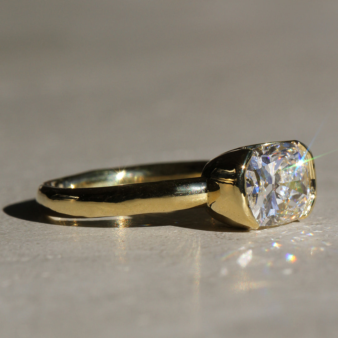 Poppy Bezel - East-West Cushion Solitaire (LG)