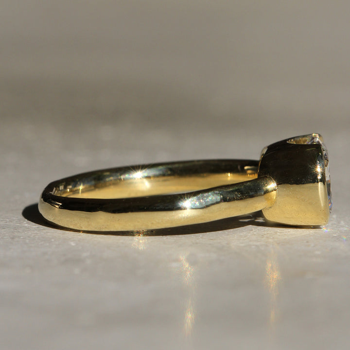 Poppy Bezel - East-West Cushion Solitaire (LG)