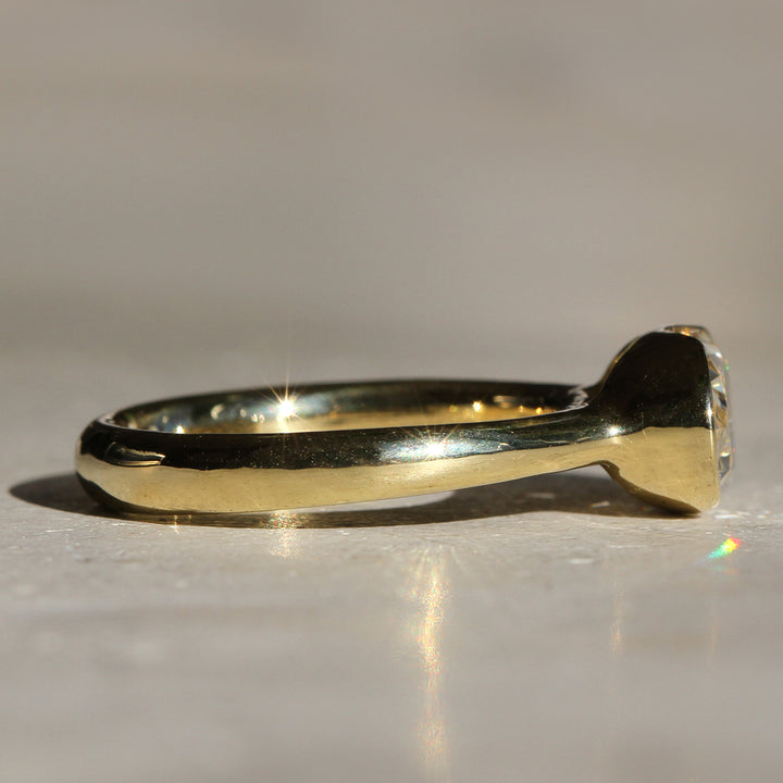 Poppy Bezel - East-West Oval Lofted Solitaire