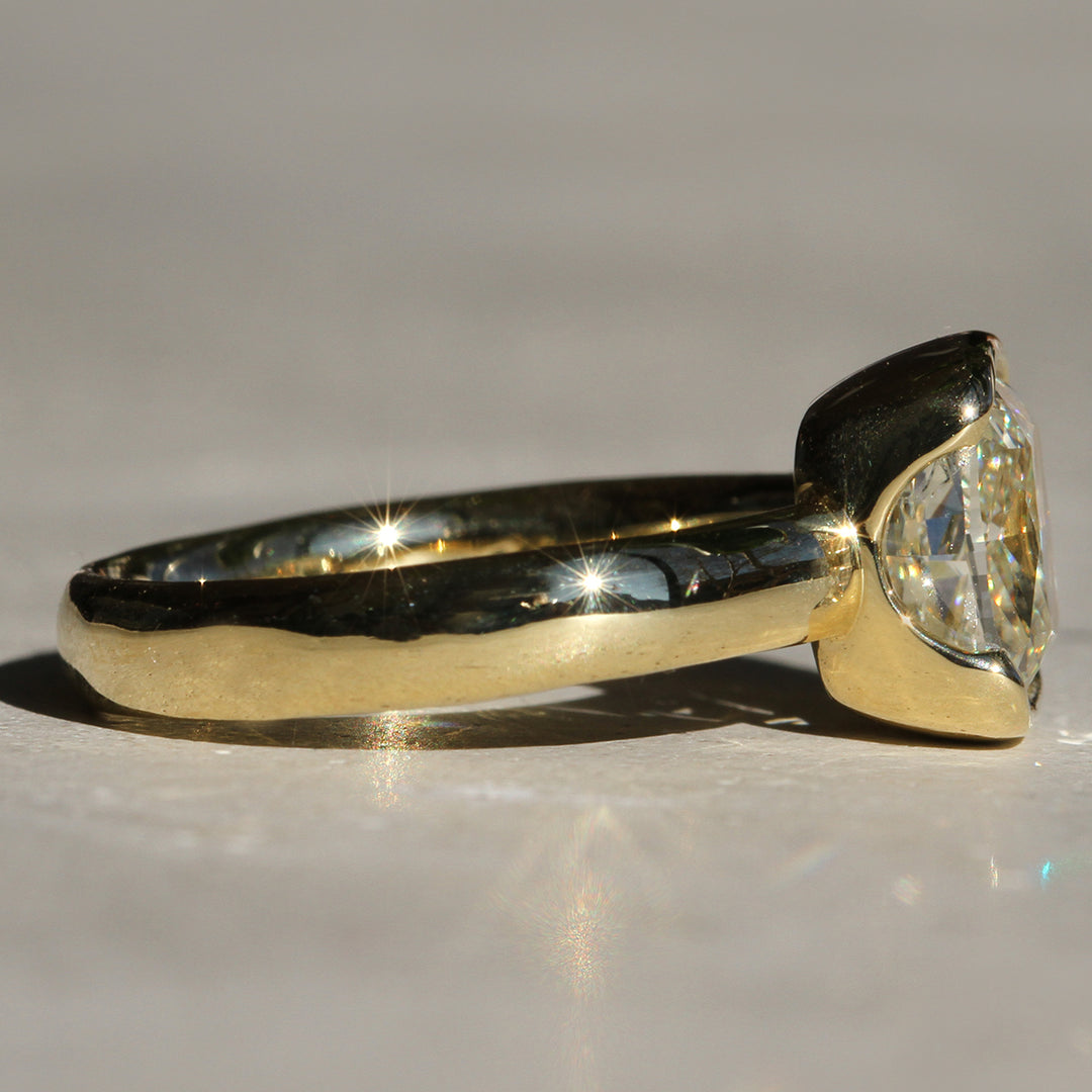 Poppy Bezel - North-South Cushion Solitaire