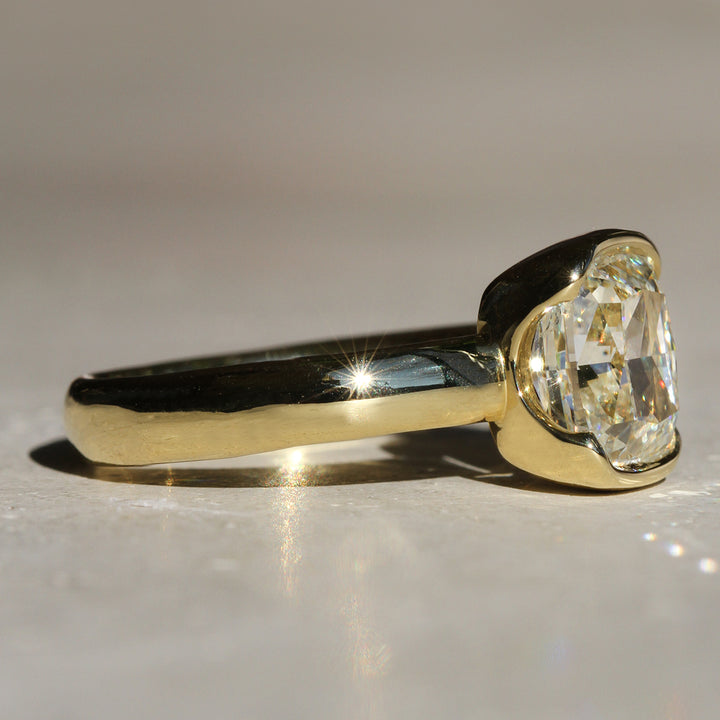 Poppy Bezel - North-South Cushion Solitaire