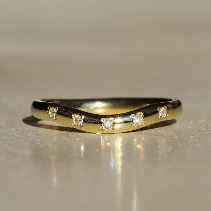 Shallow Curved Sprinkle Diamond Band