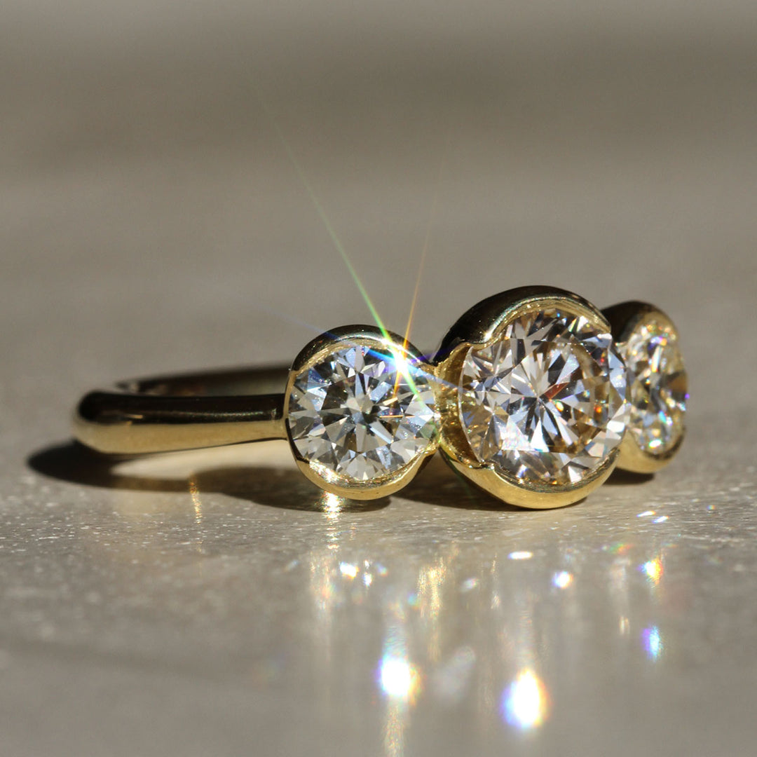 Poppy Bezel - Three-Stone
