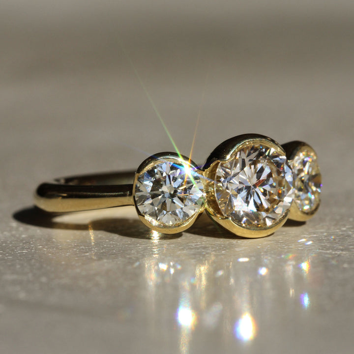 Poppy Bezel - Three-Stone