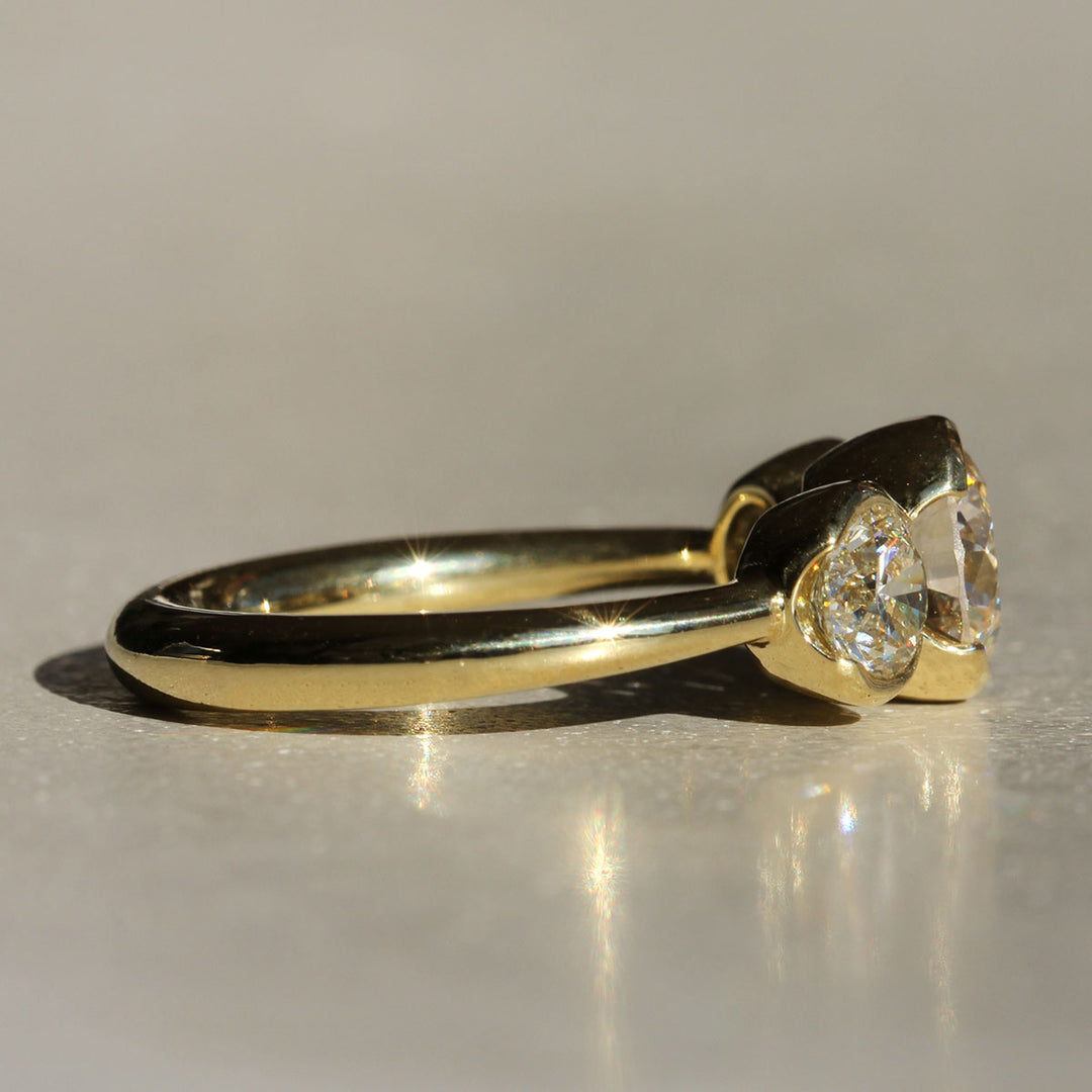 Poppy Bezel - Three-Stone