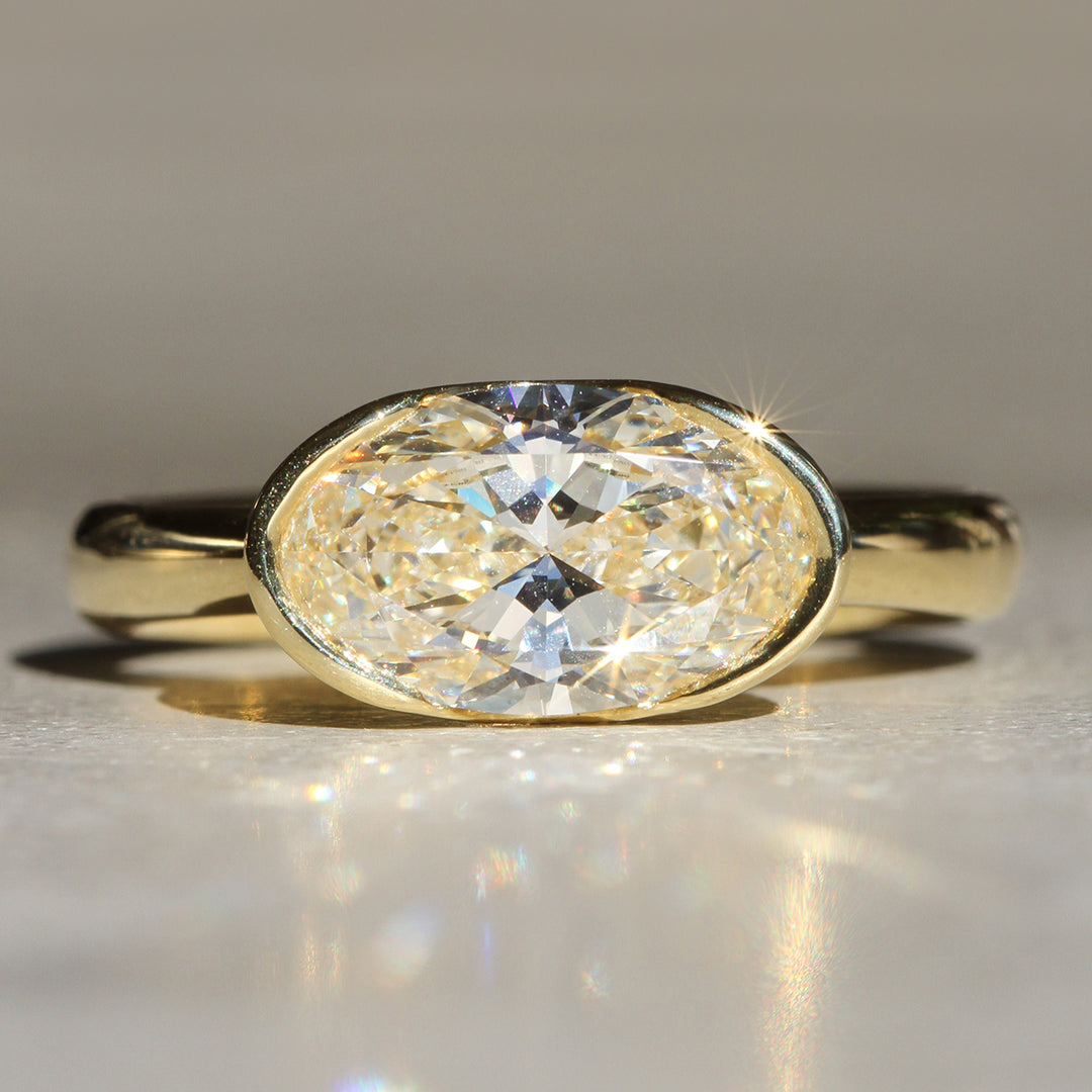 Sophie Hughes Poppy Bezel - East-West Oval Lofted Solitaire