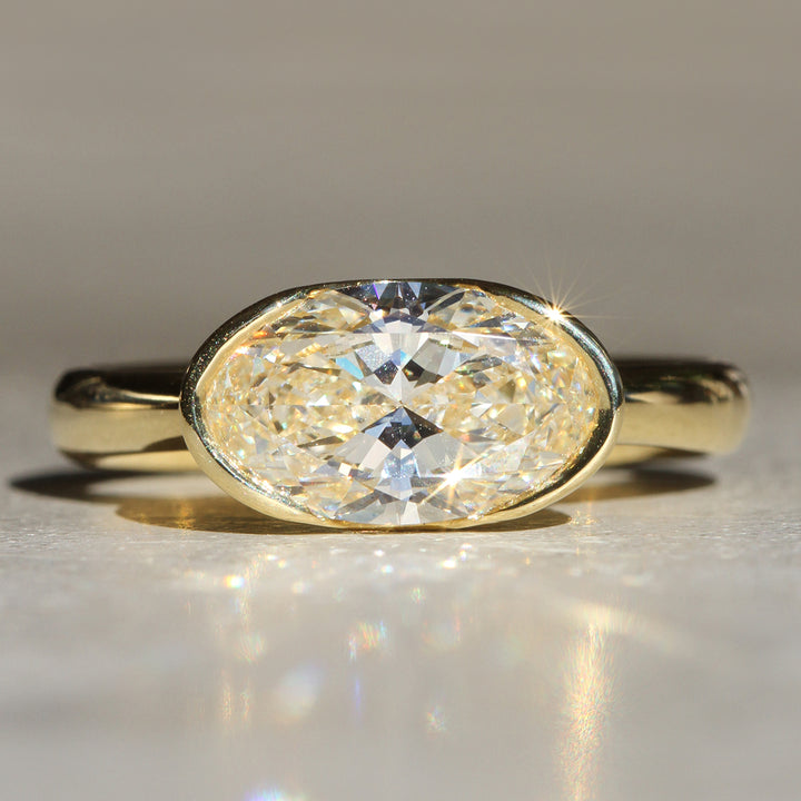 Sophie Hughes Poppy Bezel - East-West Oval Lofted Solitaire