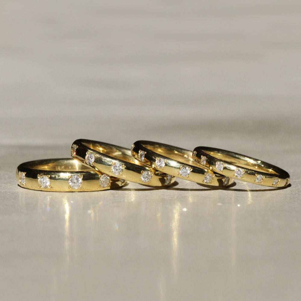 Sophie Hughes Sprinkle Diamond Bands in 18K Yellow Gold, shown in the four available widths