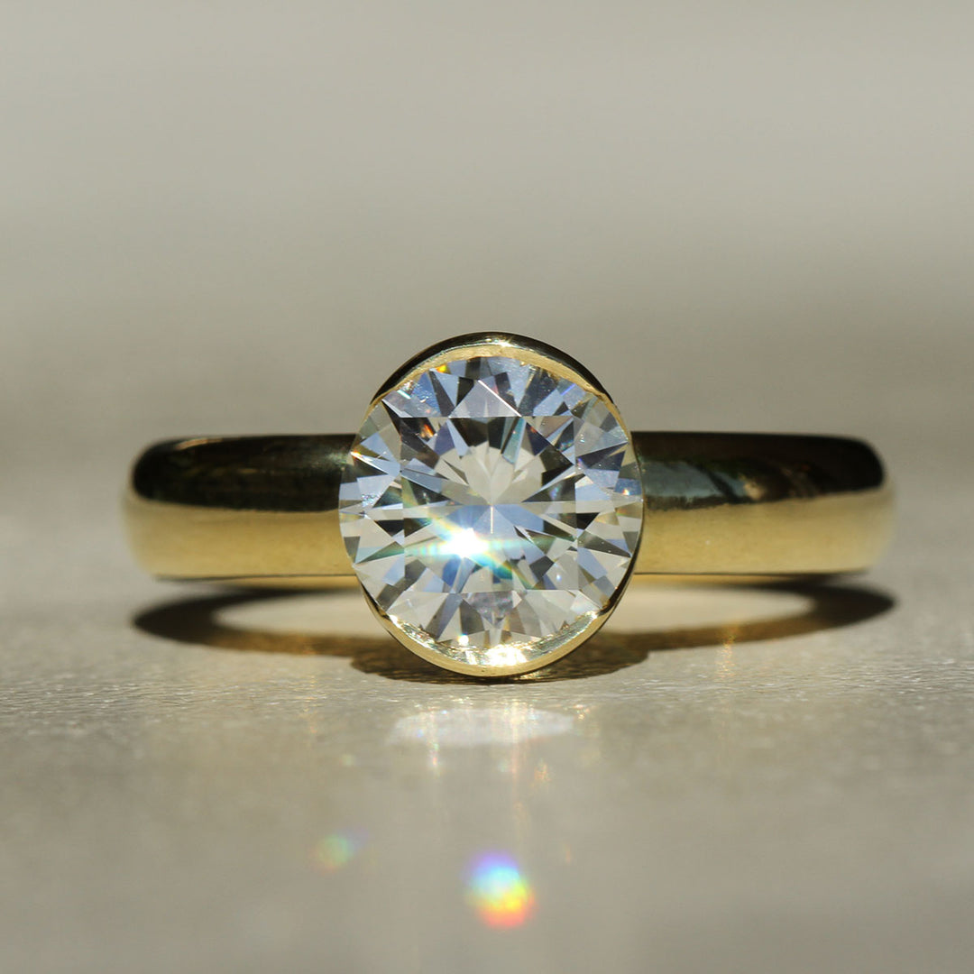 Sophie Hughes Poppy Bezel Bold Solitaire in 18K Yellow Gold featuring a 2-ct Round Brilliant cut Diamond